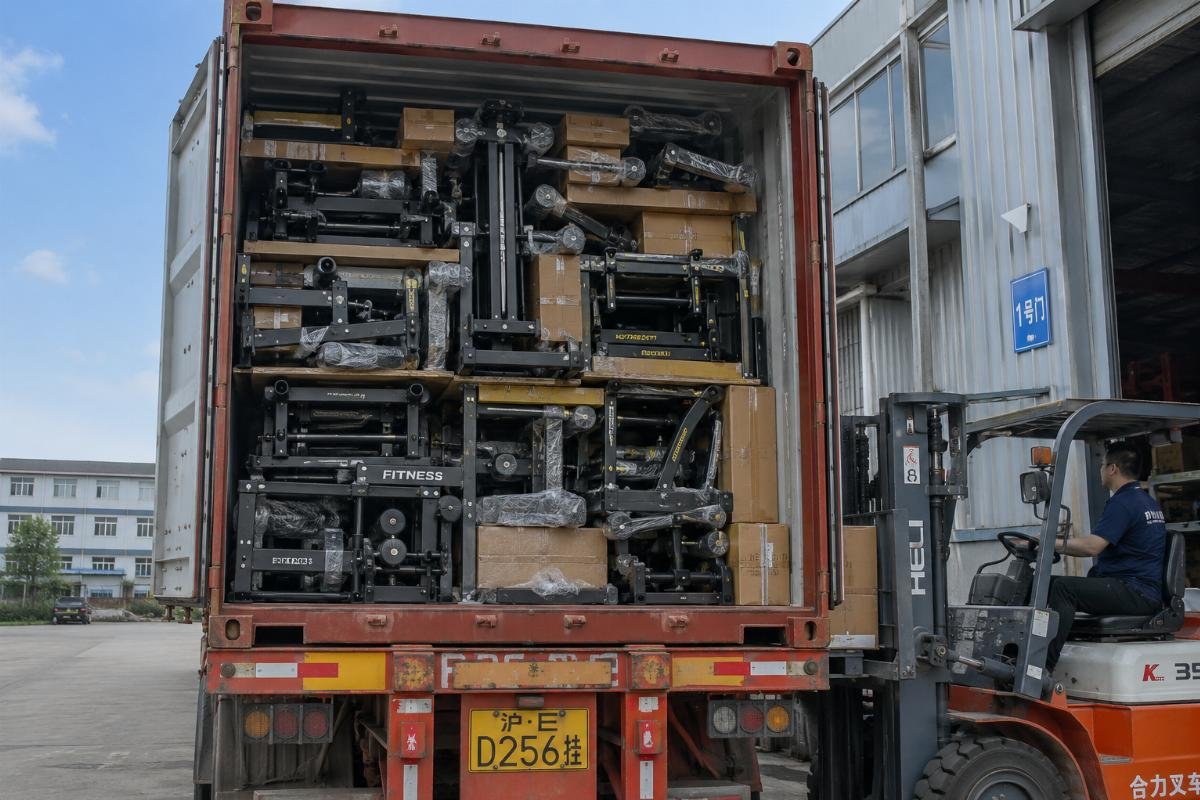 bulk commercial equipment shipping A full 40HQ container being loaded with stacked commercial gym equipment